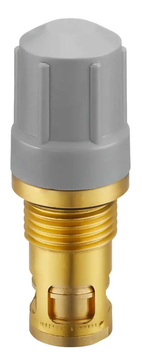 Ventileinsatz von Oventrop mit grauem Kopf und goldfarbener Metallbasis, mit Schlitz für die Klemmverbindung und seitlicher Sitzabdichtung.